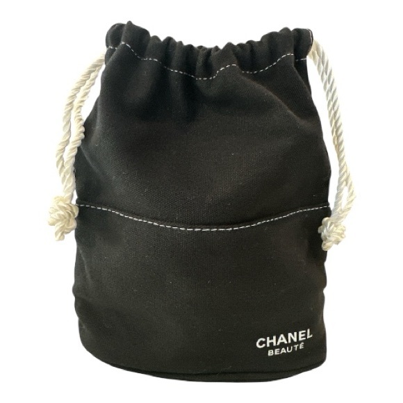 CHANEL Handbags - Black CHANEL Drawstring Make Up Bag. Late 90’s bought with perfume set. BAG ONLY